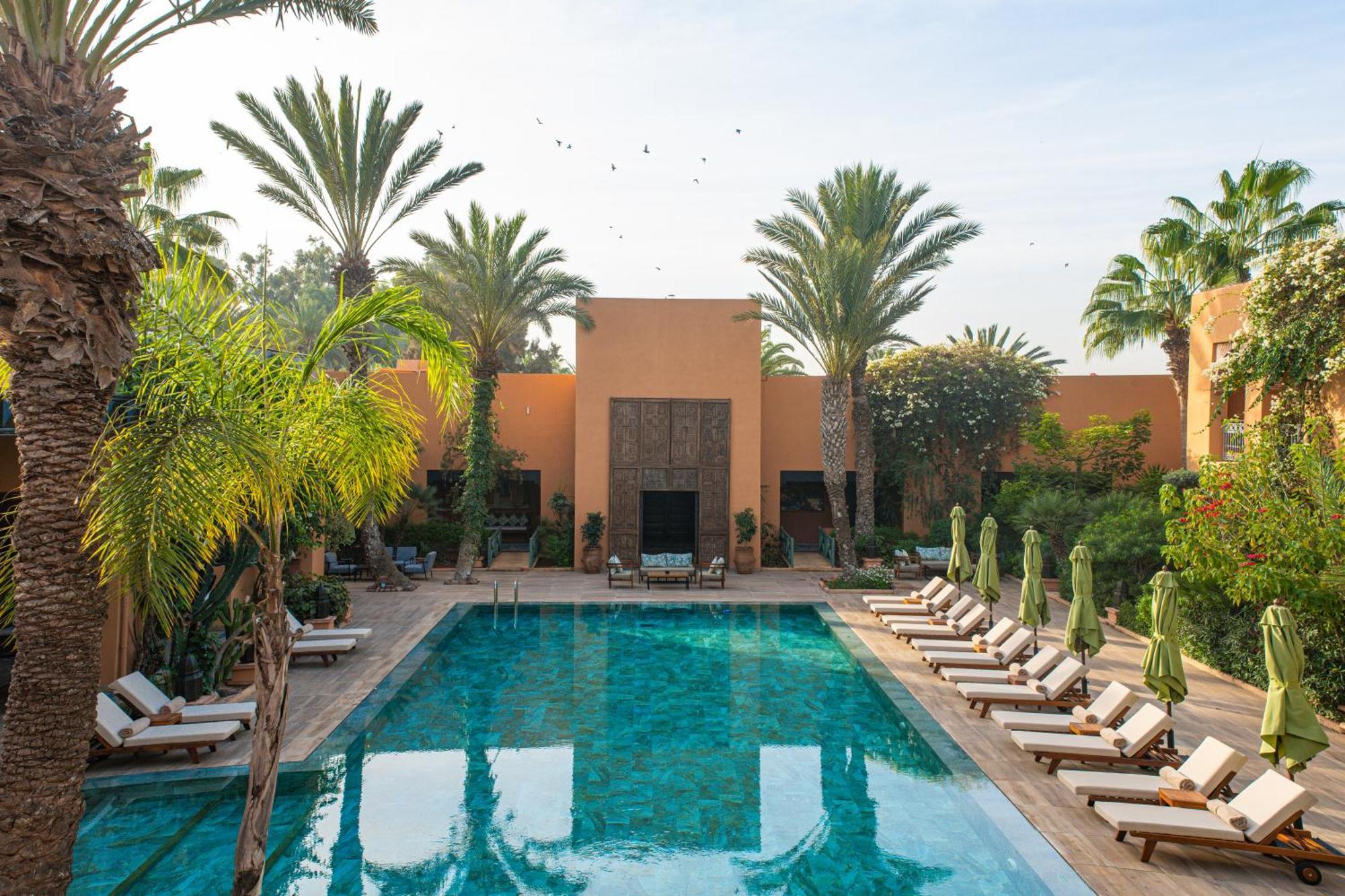 Tikida Golf Palace Agádír Exteriér fotografie The swimming pool at the Ouarzazate hotel